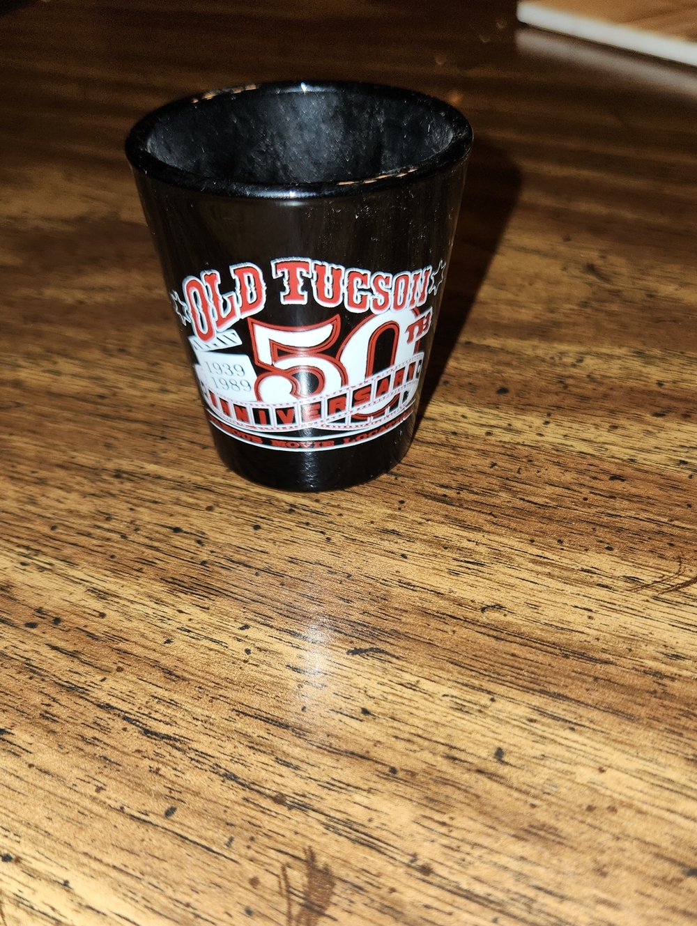 Black Souvenir Shot Glass with Red & White 50th Anniversary Graphics
